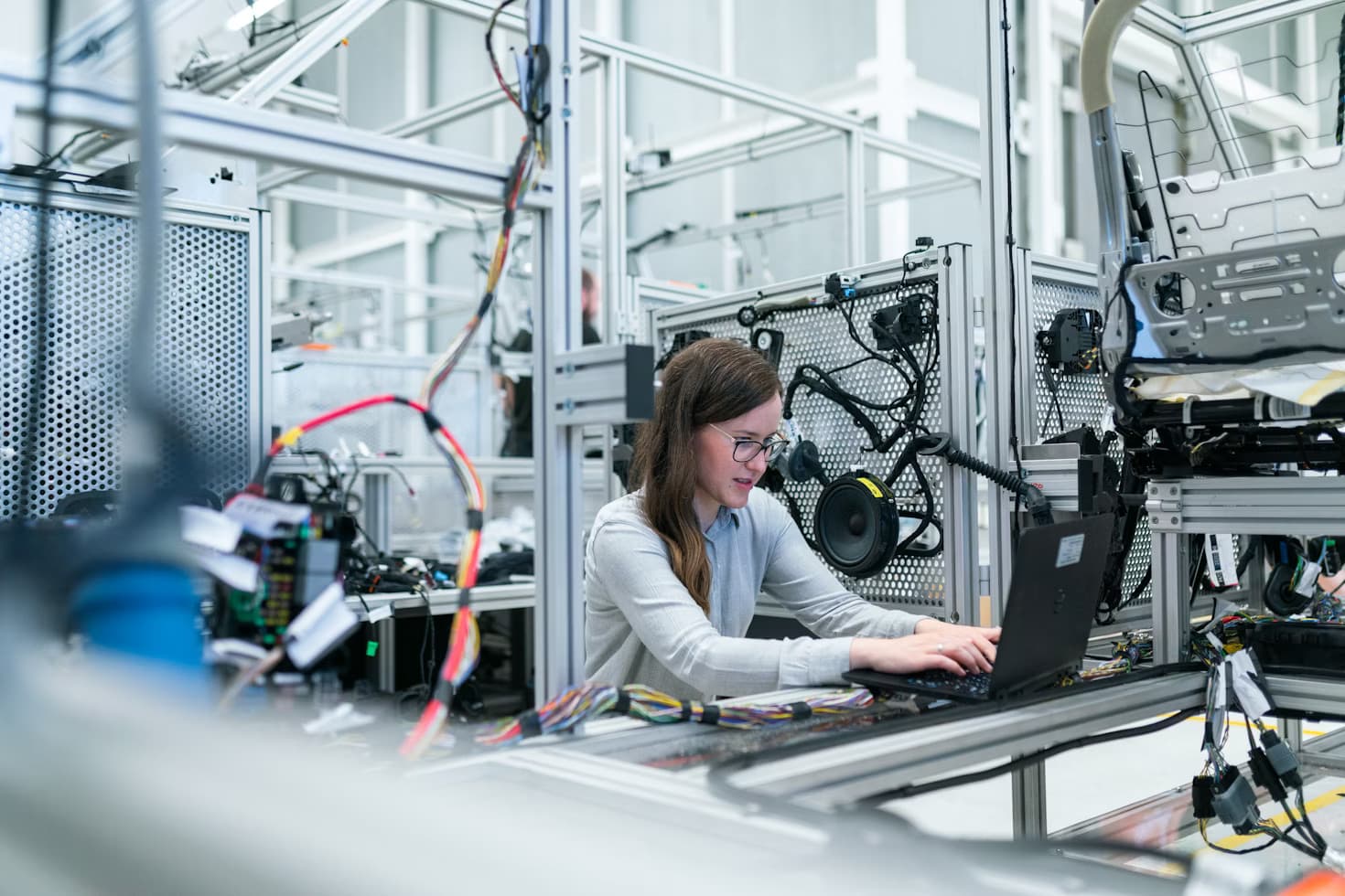 engineer working on assebmly bench